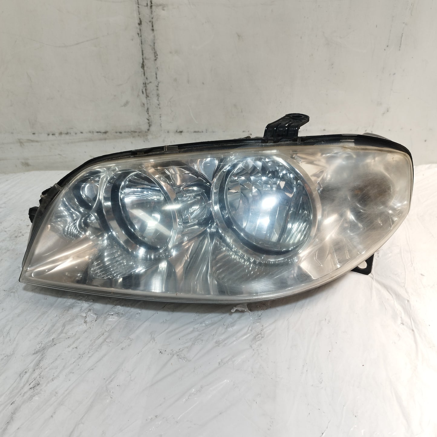 Fanale anteriore sx Fiat Punto 188 Restyling 2003-2010 ecoAC16582