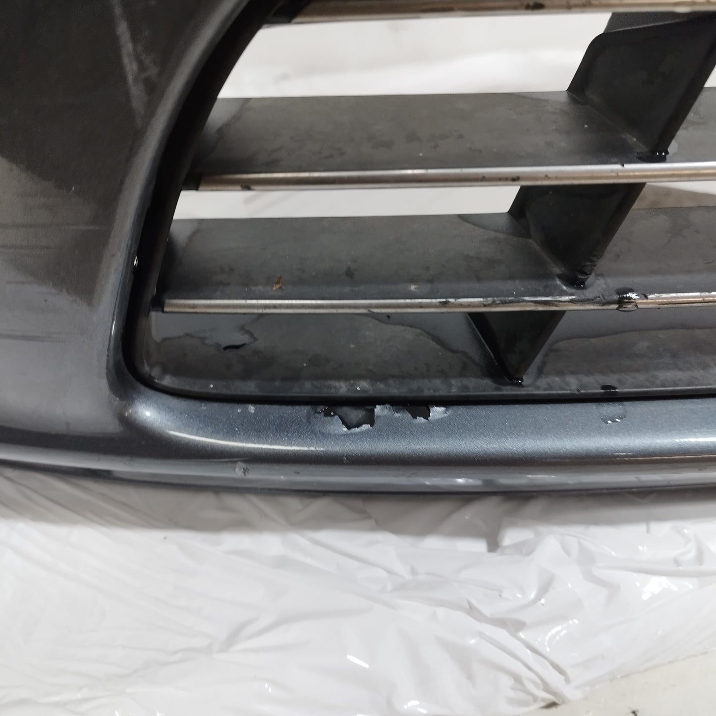 Paraurti anteriore grigio scuro Lancia Musa II serie 2007-2013 Restyling ecoAC15430