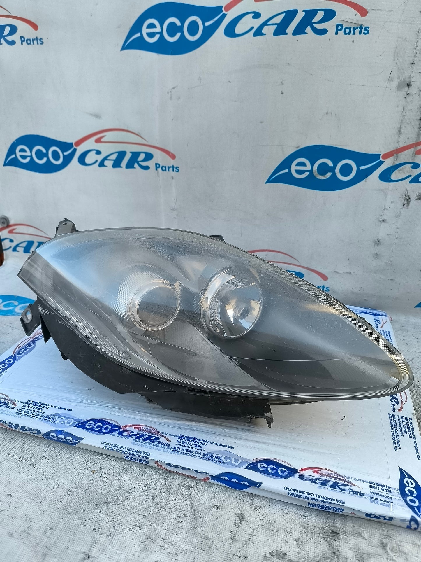 Fanale anteriore dx Fiat Bravo 2008 (fondo scuro freccia bianca) ecoAG6172