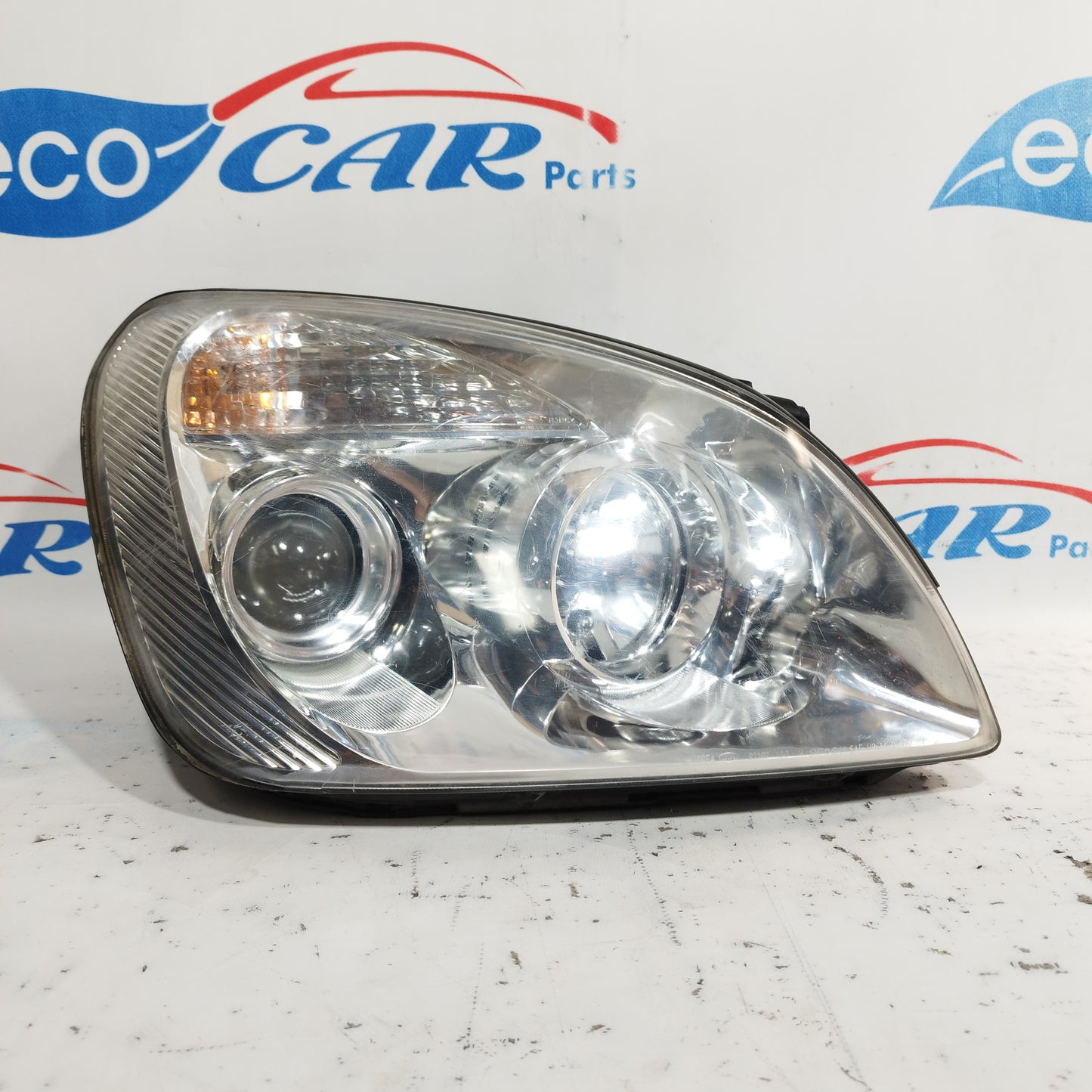 Fanale anteriore dx Kia Carens 2003 ecoAC8383