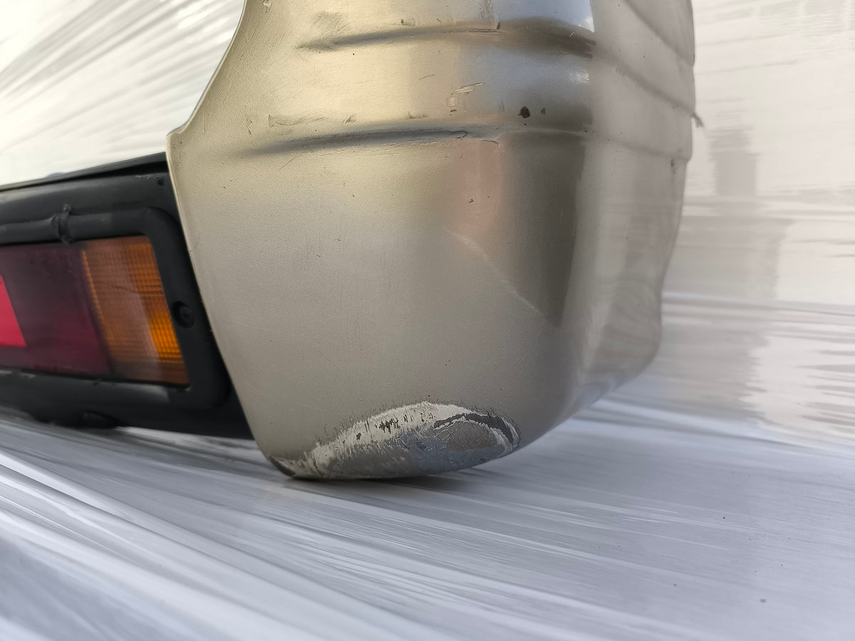Paraurti posteriore Mitsubishi Pajero II  3 porte (V20) / 5 porte (V40) anno 1996-1999 ecoAG10003