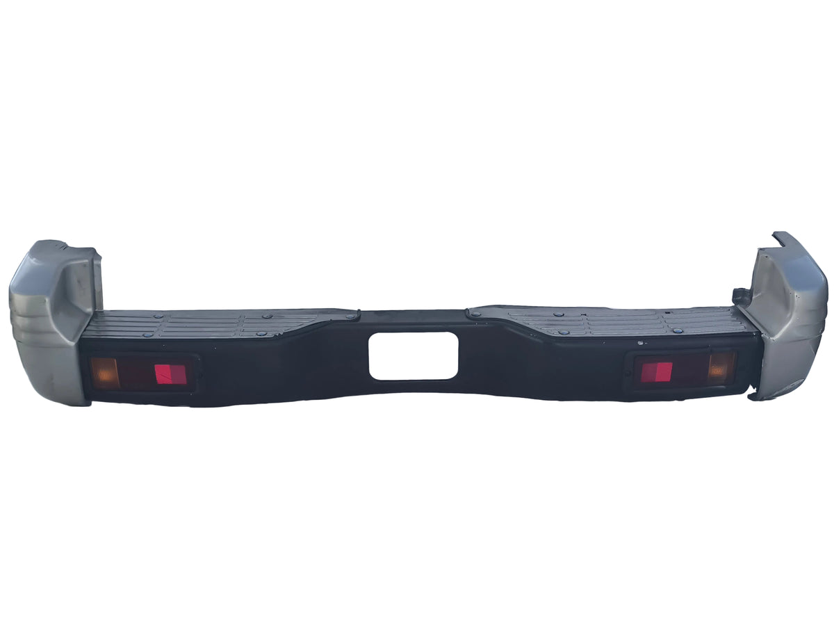 Paraurti posteriore Mitsubishi Pajero II  3 porte (V20) / 5 porte (V40) anno 1996-1999 ecoAG10003