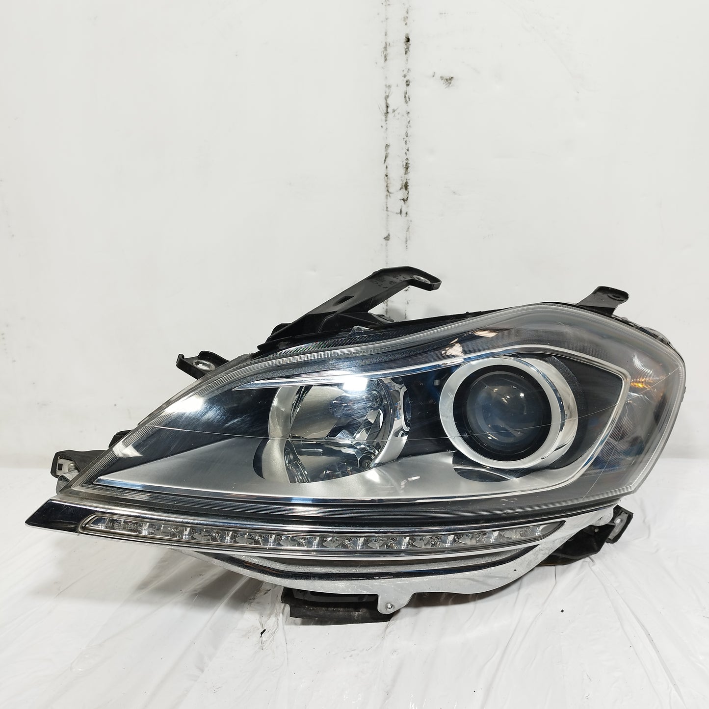 Fanale anteriore sx Lancia Delta III serie (844) 2008-2014 ecoAC15025