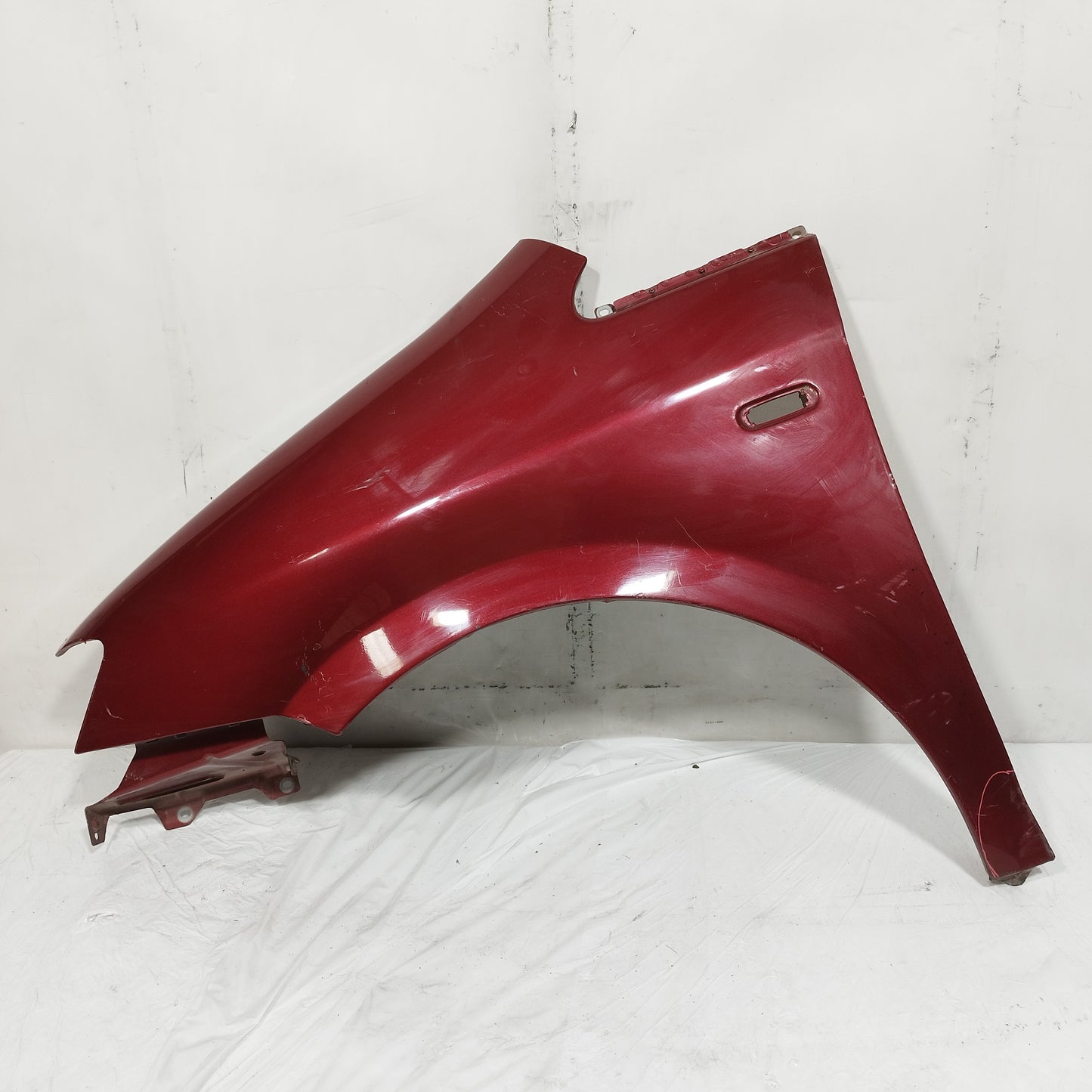 Parafango anteriore sx bordò Fiat Idea 2005-2012 ecoAC16163