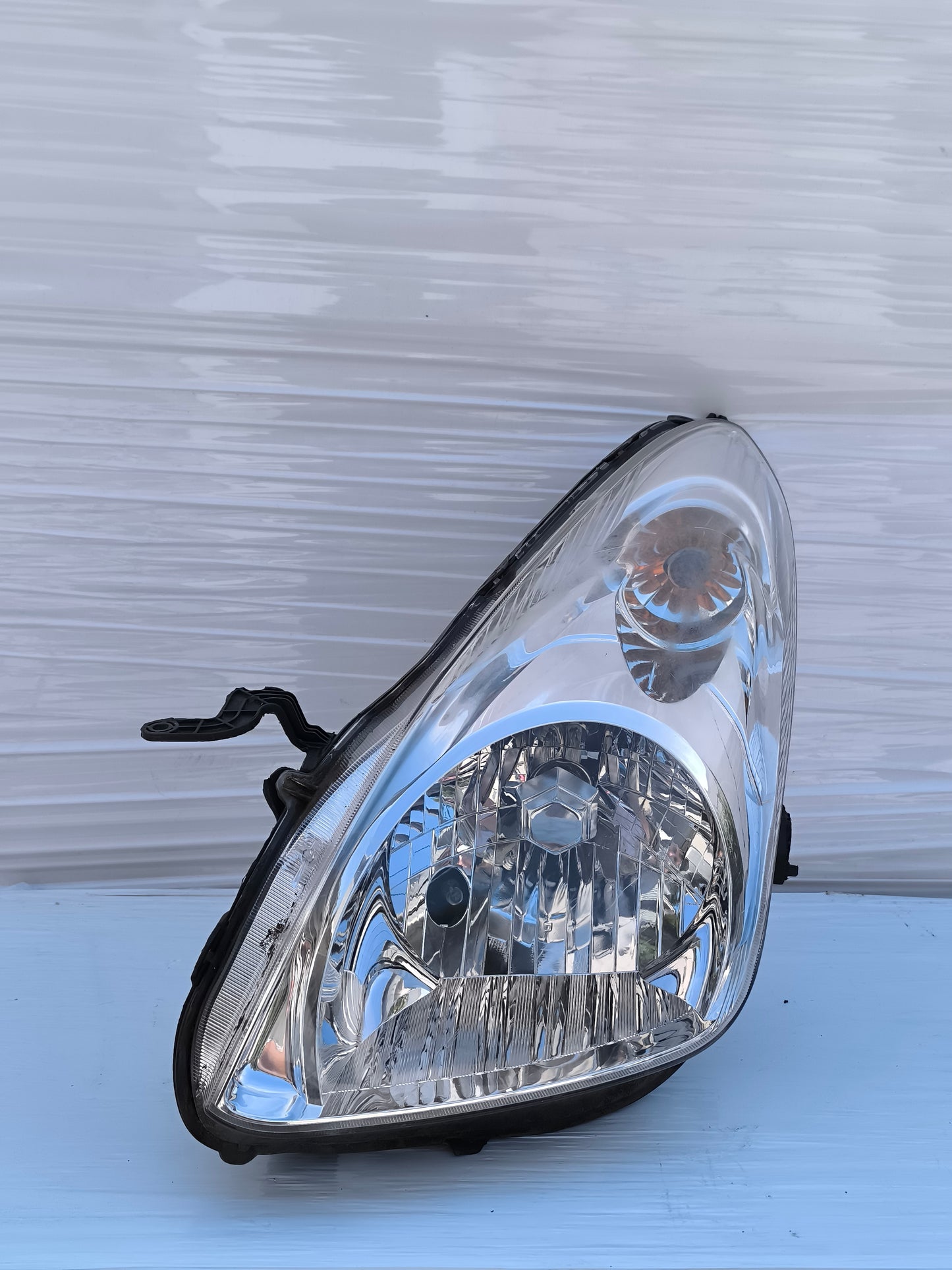 Fanale anteriore sx Nissan Pixo (UA0) anno 2009-2013 ecoAG8378