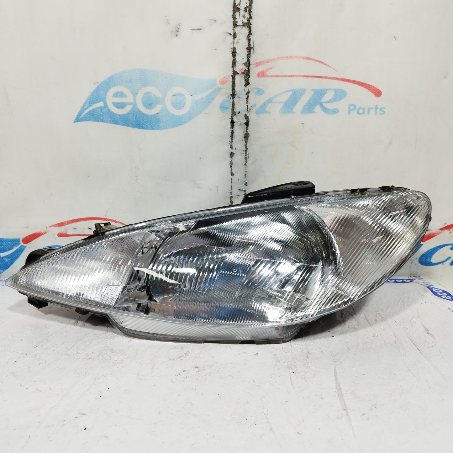 Left front light Peugeot 206 2001 DEPO ecoAC10718