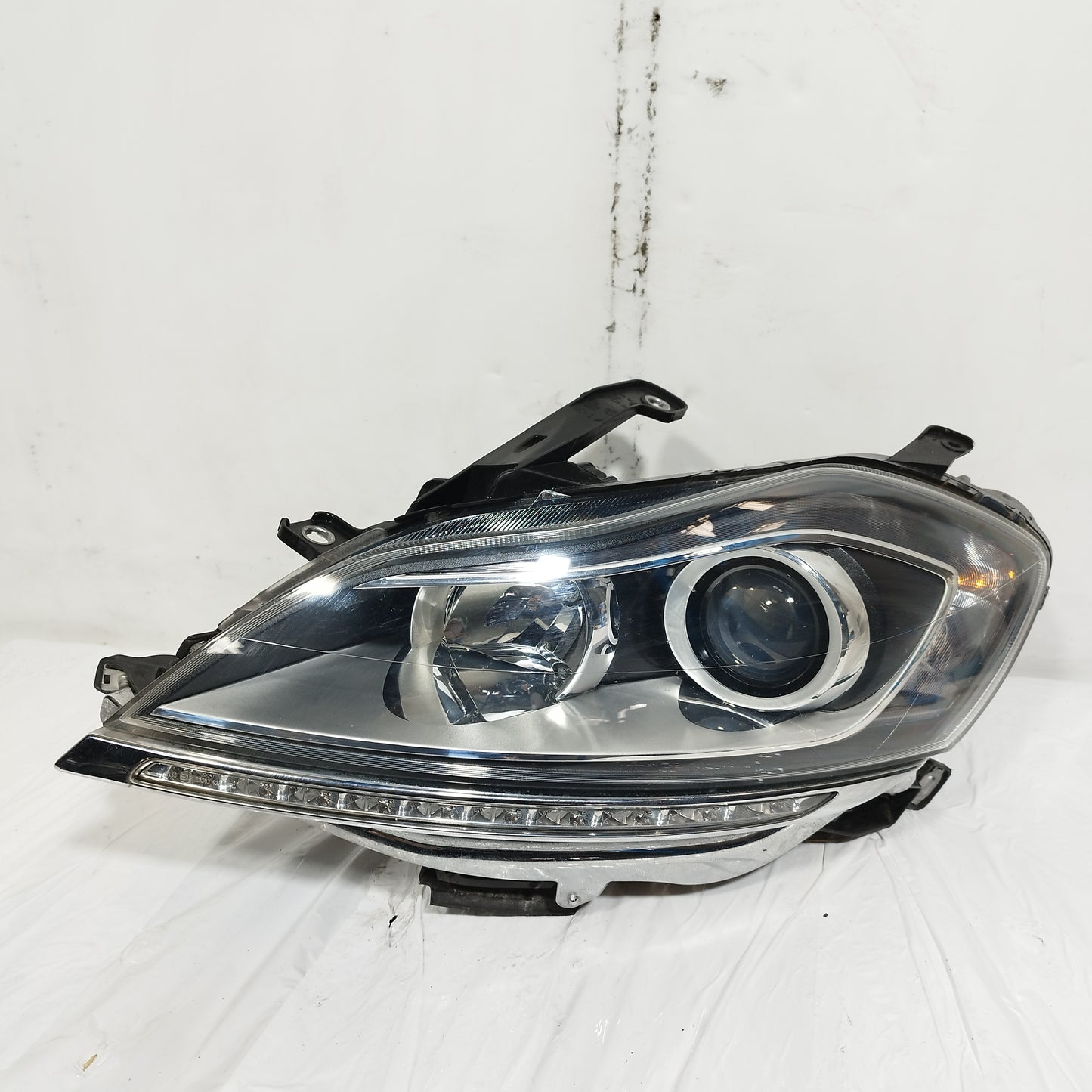 Fanale anteriore sx Lancia Delta III serie (844) 2008-2014 ecoAC15025