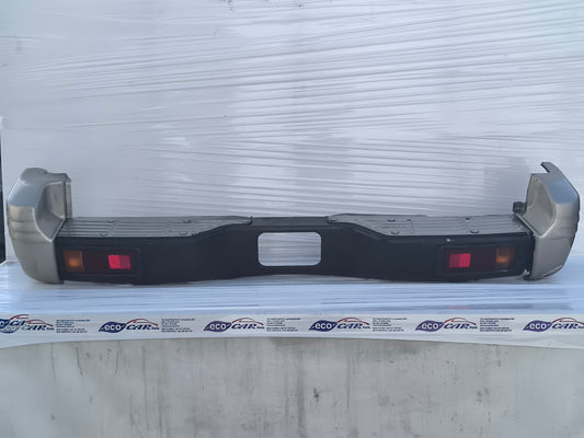 Paraurti posteriore Mitsubishi Pajero II  3 porte (V20) / 5 porte (V40) anno 1996-1999 ecoAG10003