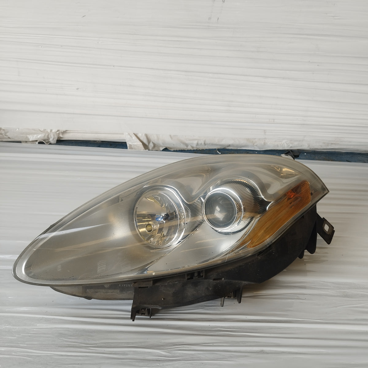 Fanale anteriore sx Fiat Bravo (198) 2007-2010 ecoAC17596