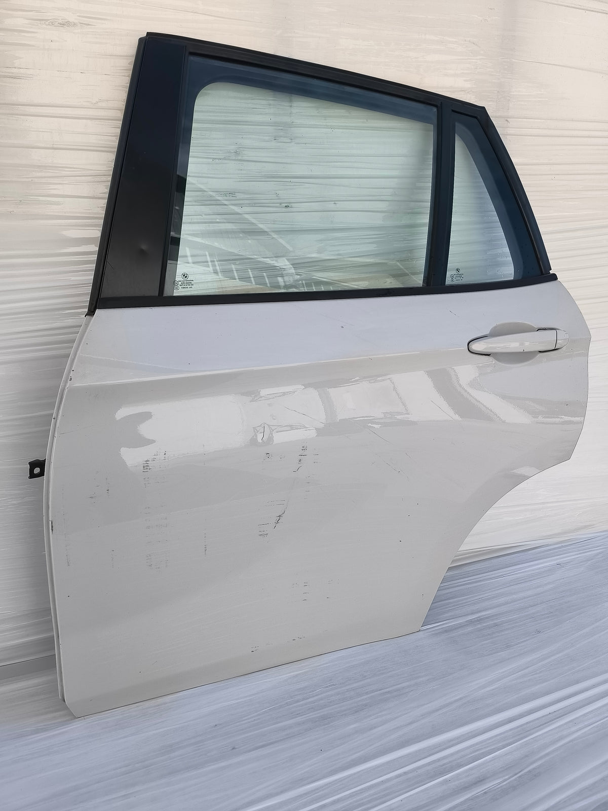 Sportello posteriore sx bianco Bmw X1 I serie E84 anno 2009-2015 ecoAG10004