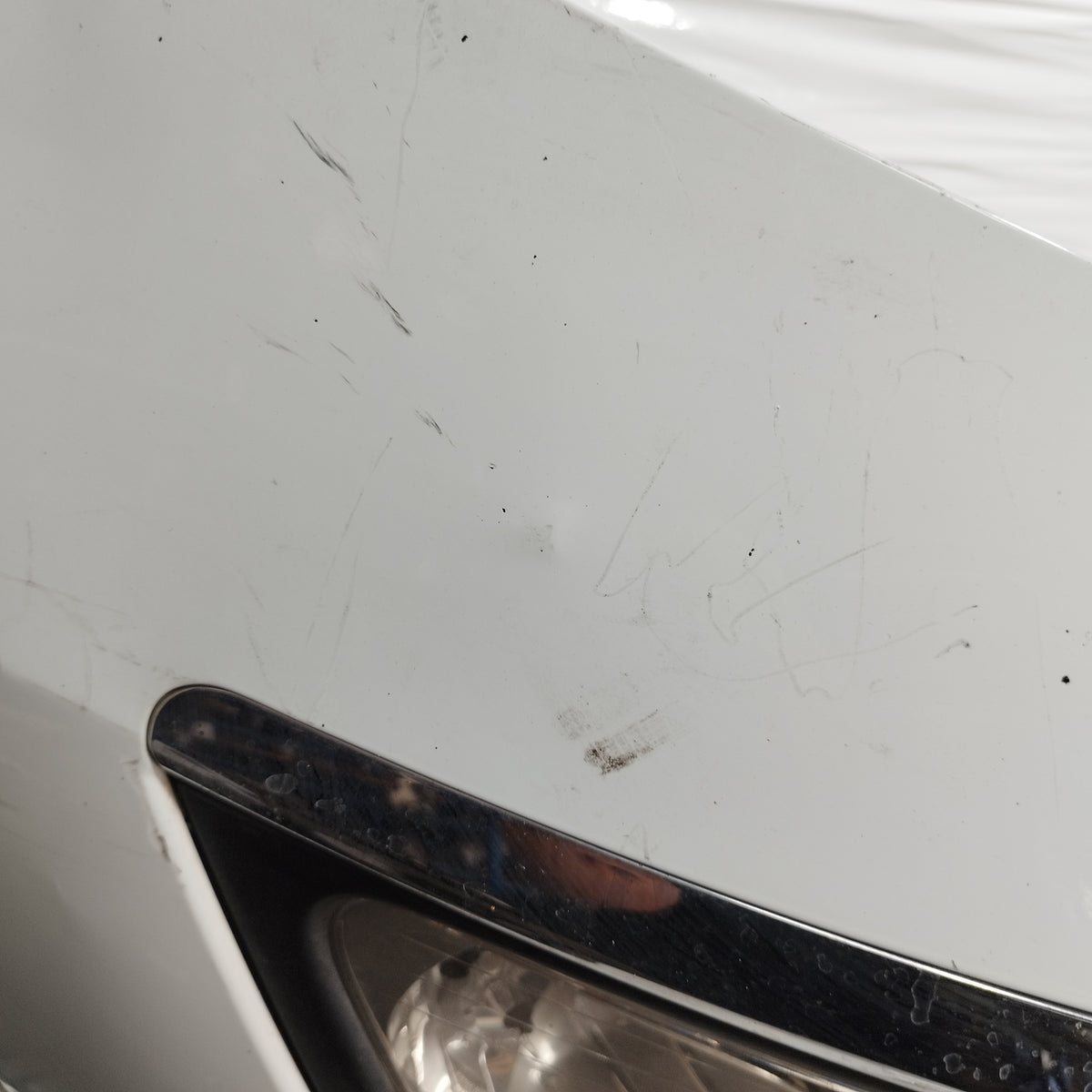 Paraurti anteriore bianco Kia Sportage III (SL) 2010-2013 ecoAC17309