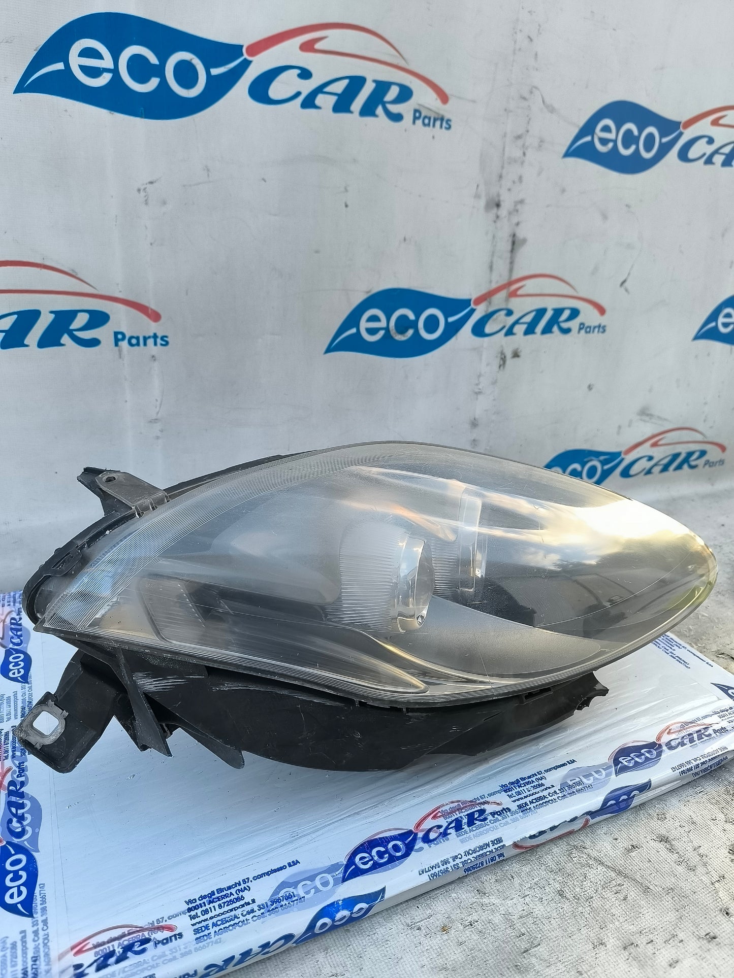 Fanale anteriore dx Fiat Bravo 2008 (fondo scuro freccia bianca) ecoAG6172