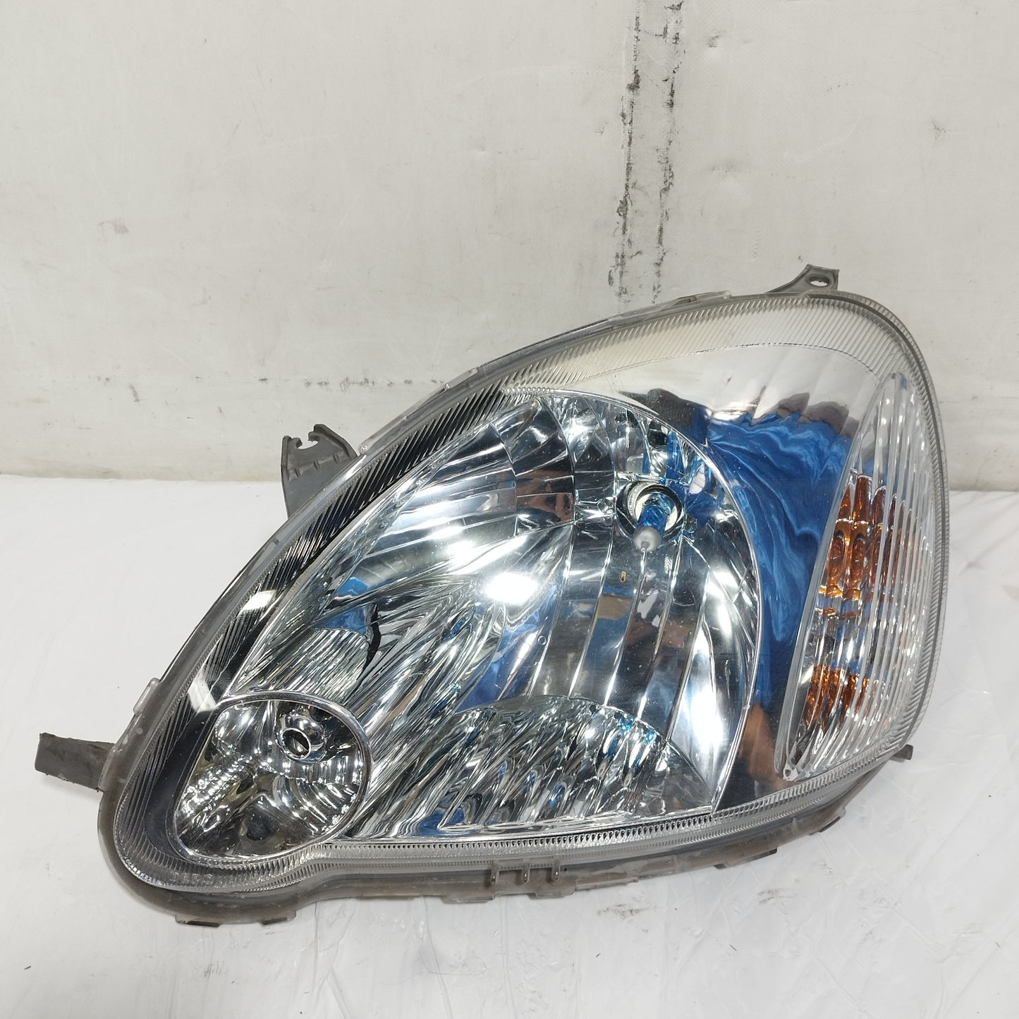 Fanale anteriore sx Toyota Yaris 2003-2005 Restyling DEPO cod: 08-212-11K8L ecoAC16421