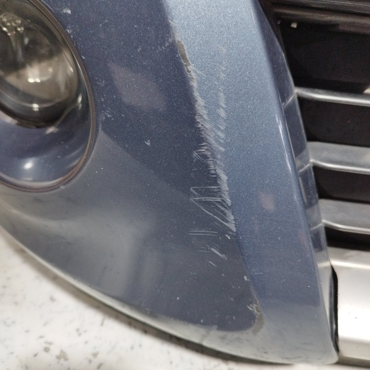 Dark grey front bumper Renault Clio 2010 ecoAC10357