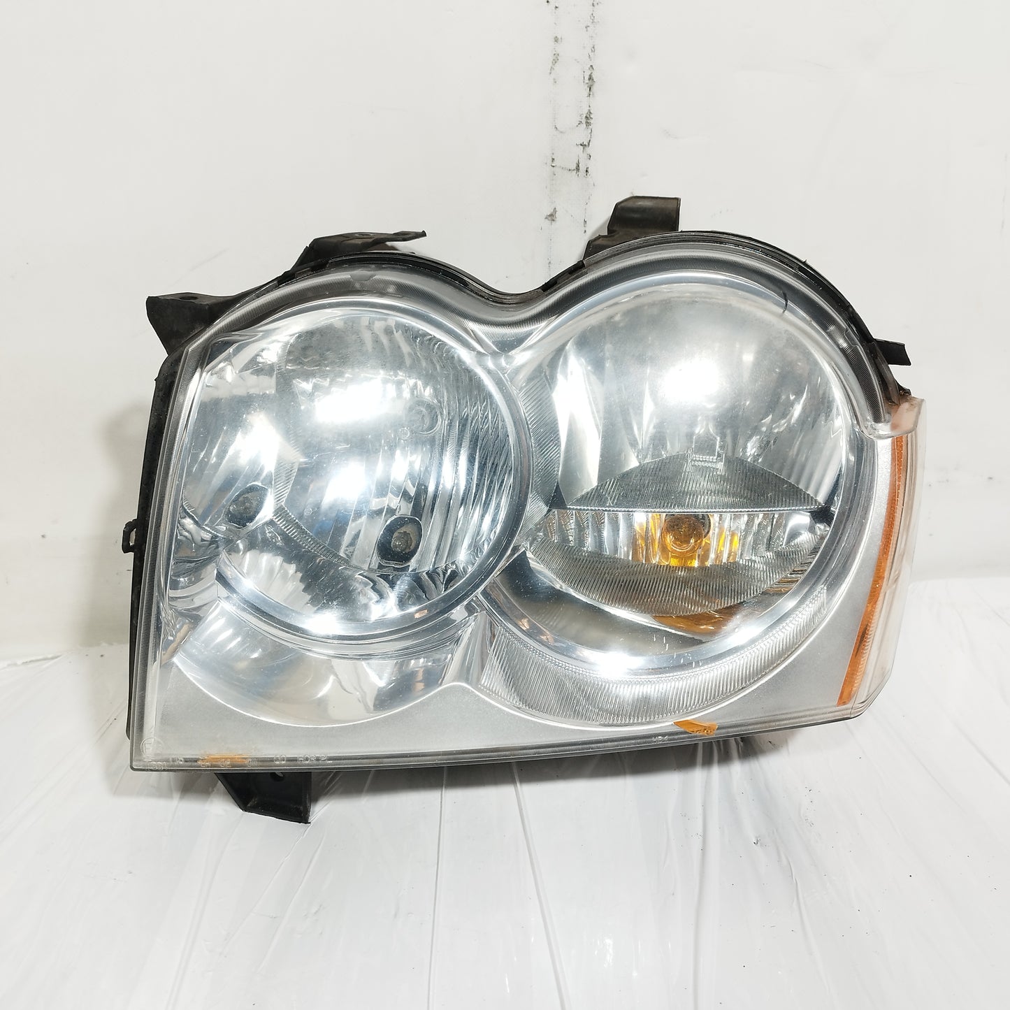 Fanale anteriore sx Jeep Grand Cherokee 2007 cod: 55156671AI ecoAC14546