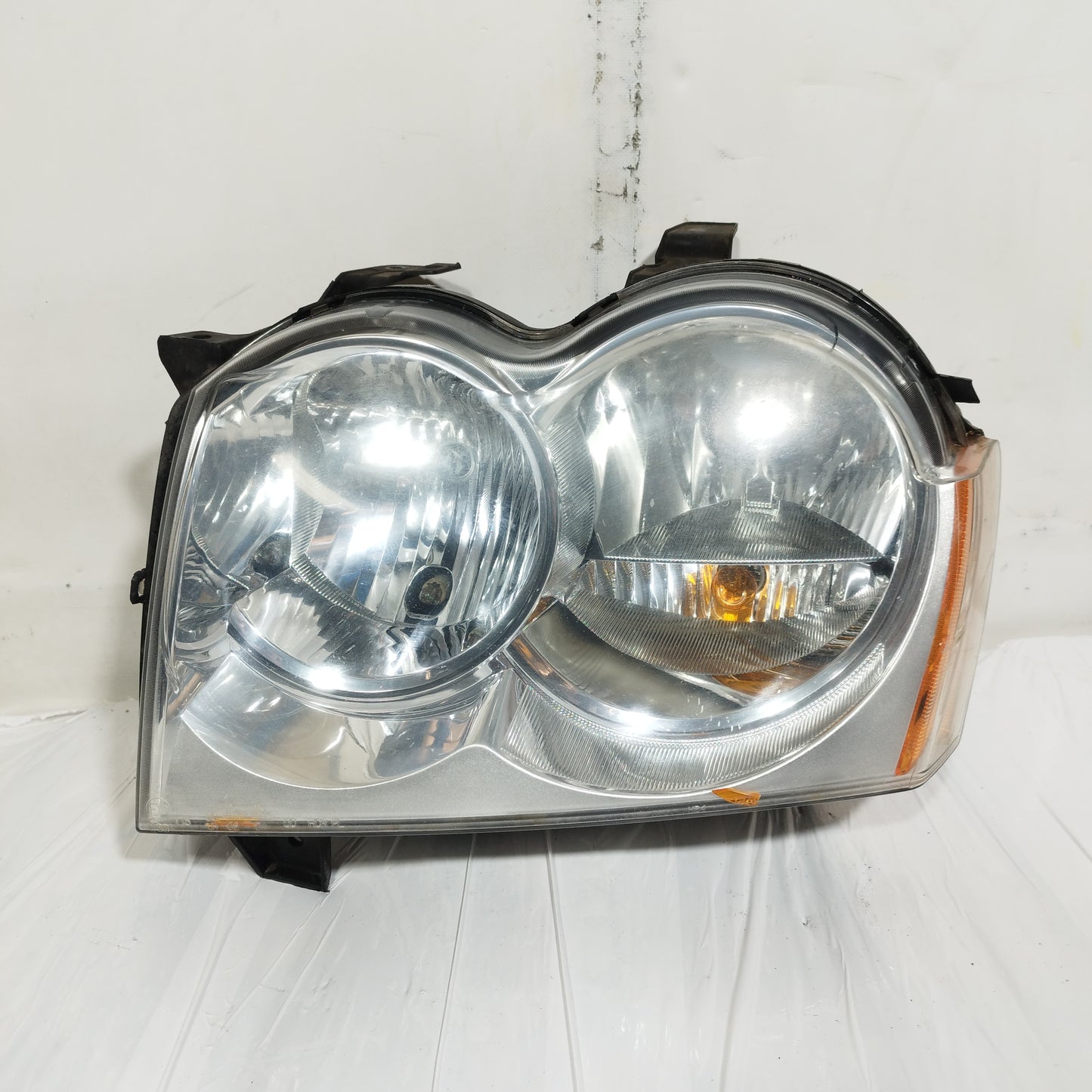 Fanale anteriore sx Jeep Grand Cherokee 2007 cod: 55156671AI ecoAC14546