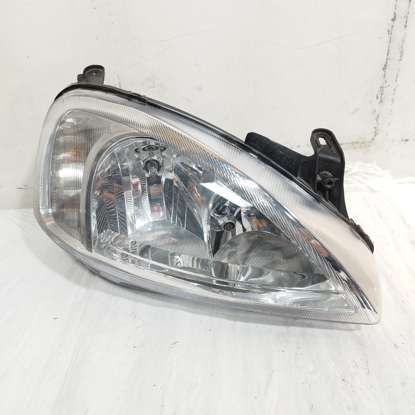 Fanale anteriore dx Opel Corsa C (X01) 2003-2005 TYC cod: 20-6065 ecoAC16559
