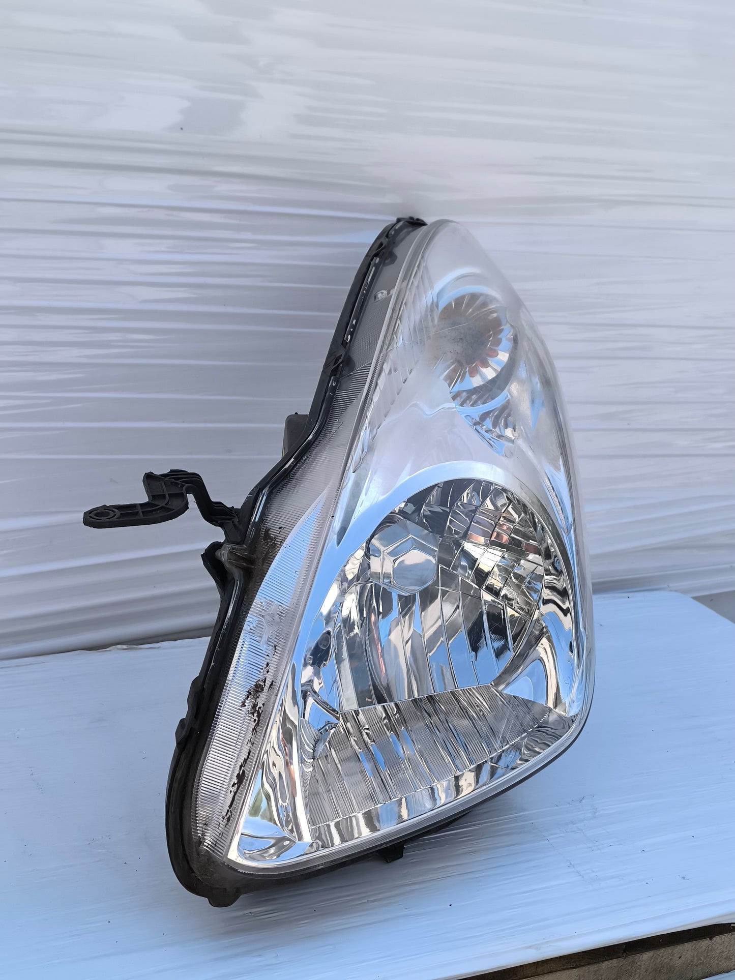 Fanale anteriore sx Nissan Pixo (UA0) anno 2009-2013 ecoAG8378