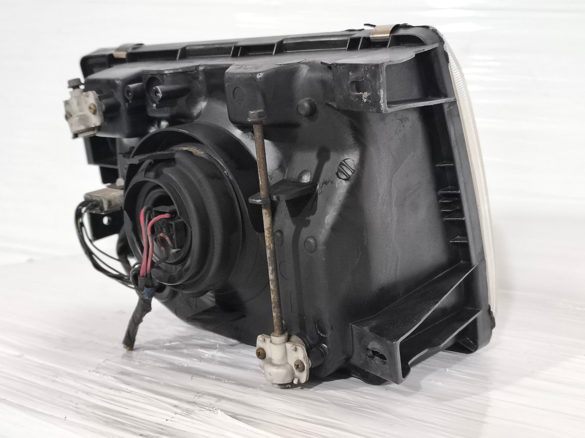 Fanale anteriore sx Mitsubishi Pajero II (V20) anno 1997-2000 ecoAG9919