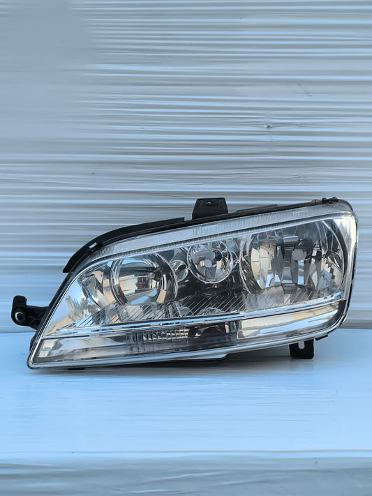 Fanale anteriore sx freccia bianca Fiat Idea / Multipla ecoAG7846