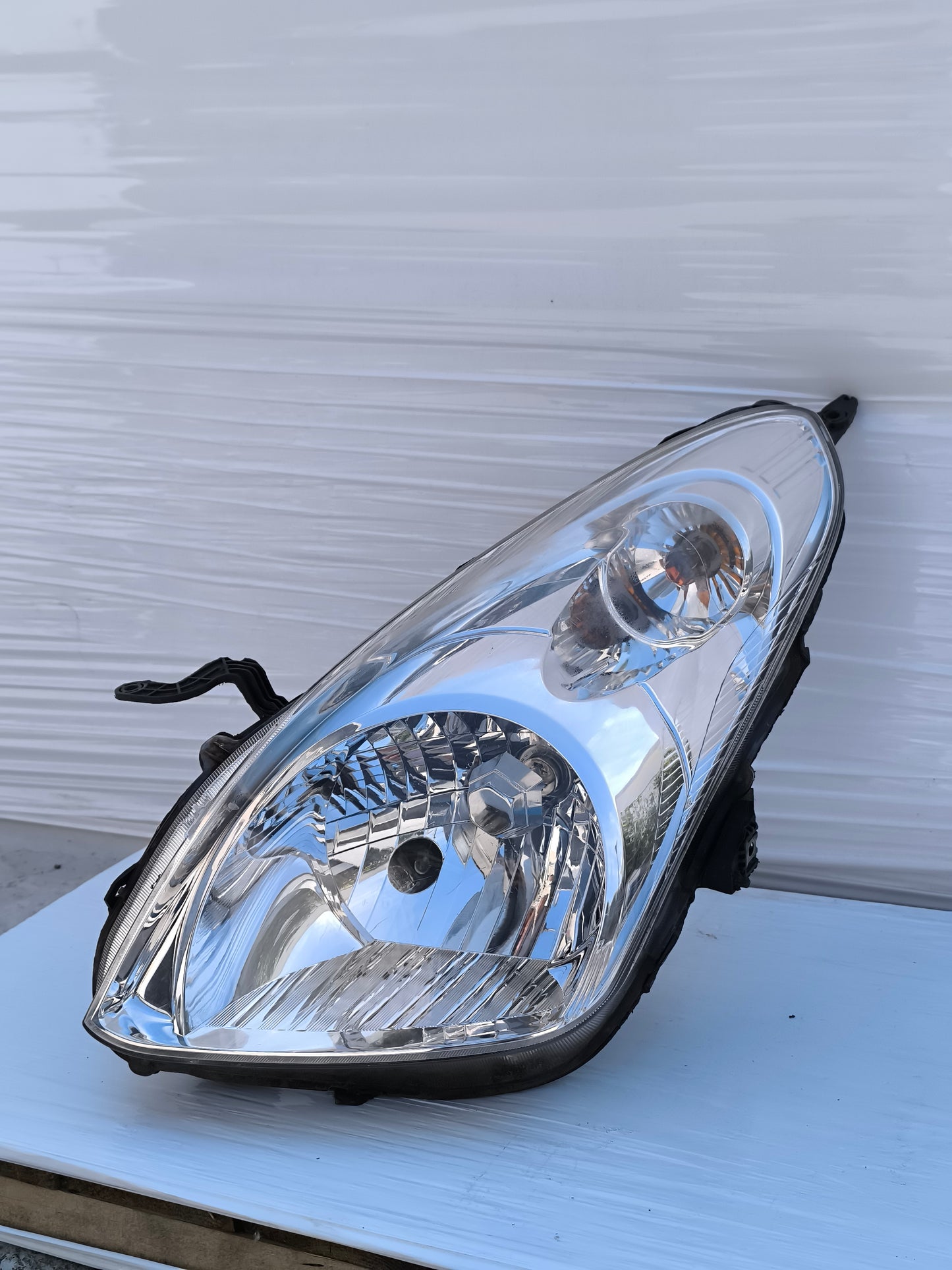 Fanale anteriore sx Nissan Pixo (UA0) anno 2009-2013 ecoAG8378