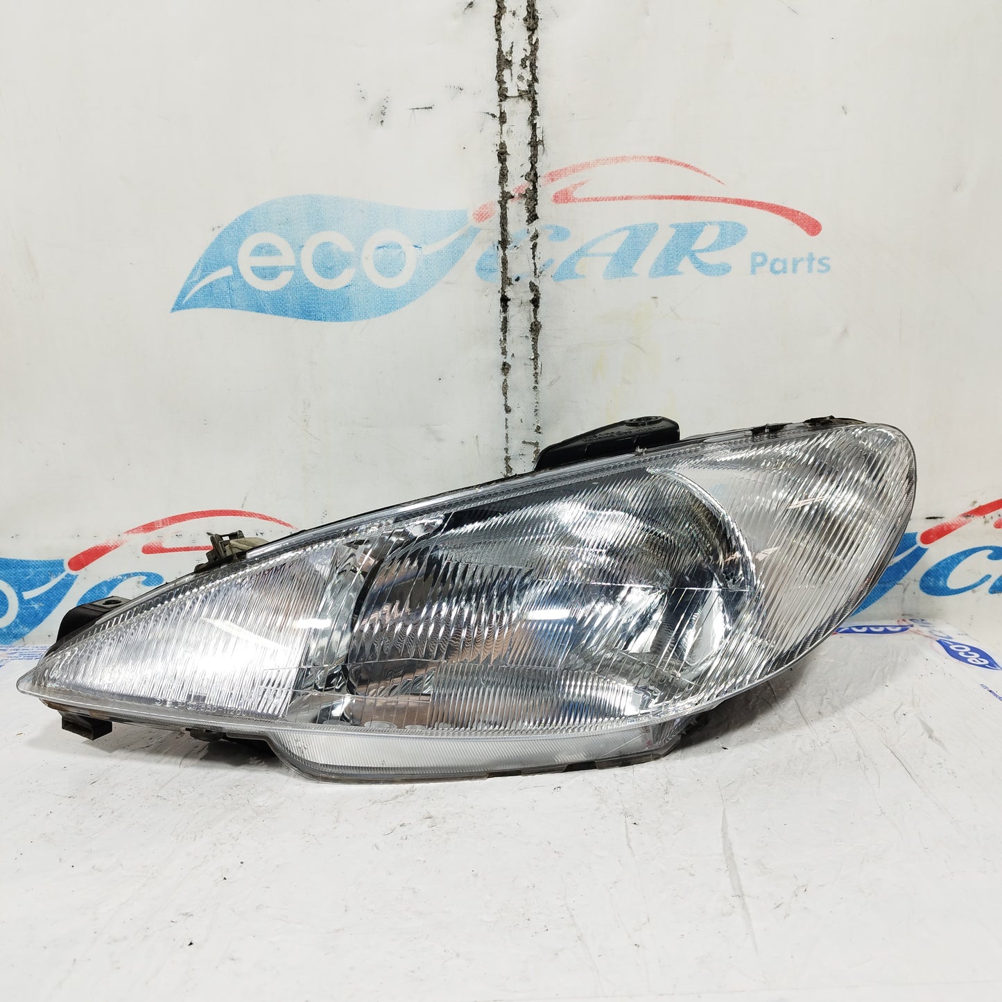 Left front light Peugeot 206 2001 DEPO ecoAC10718