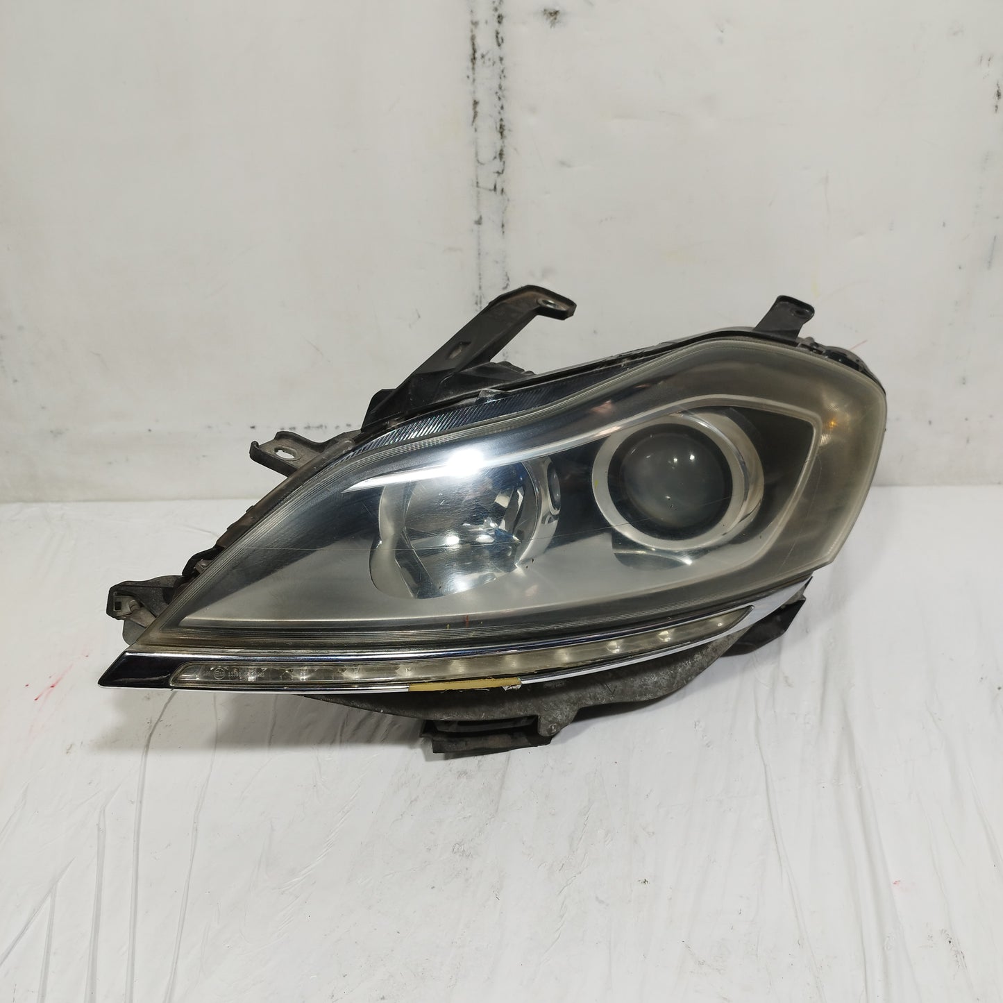 Fanale anteriore sx Lancia Delta III serie (844) 2008-2014 ecoAC14753
