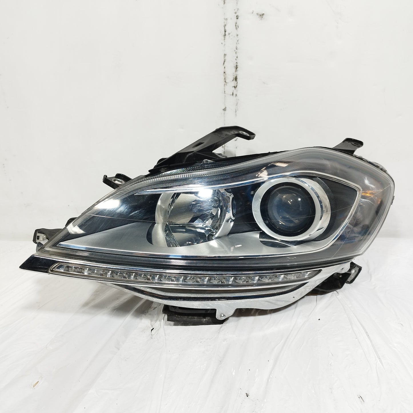 Fanale anteriore sx Lancia Delta III serie (844) 2008-2014 ecoAC15025