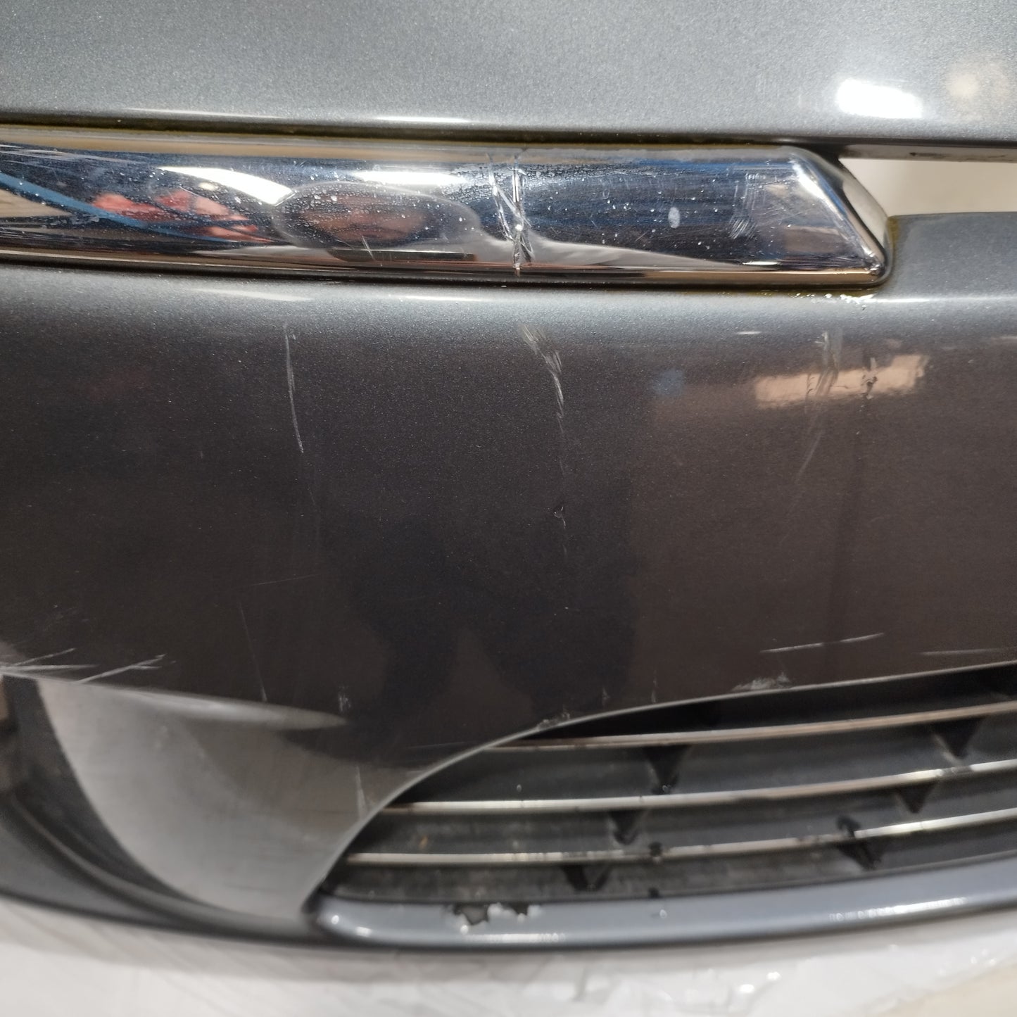 Paraurti anteriore grigio scuro Lancia Musa II serie 2007-2013 Restyling ecoAC15430