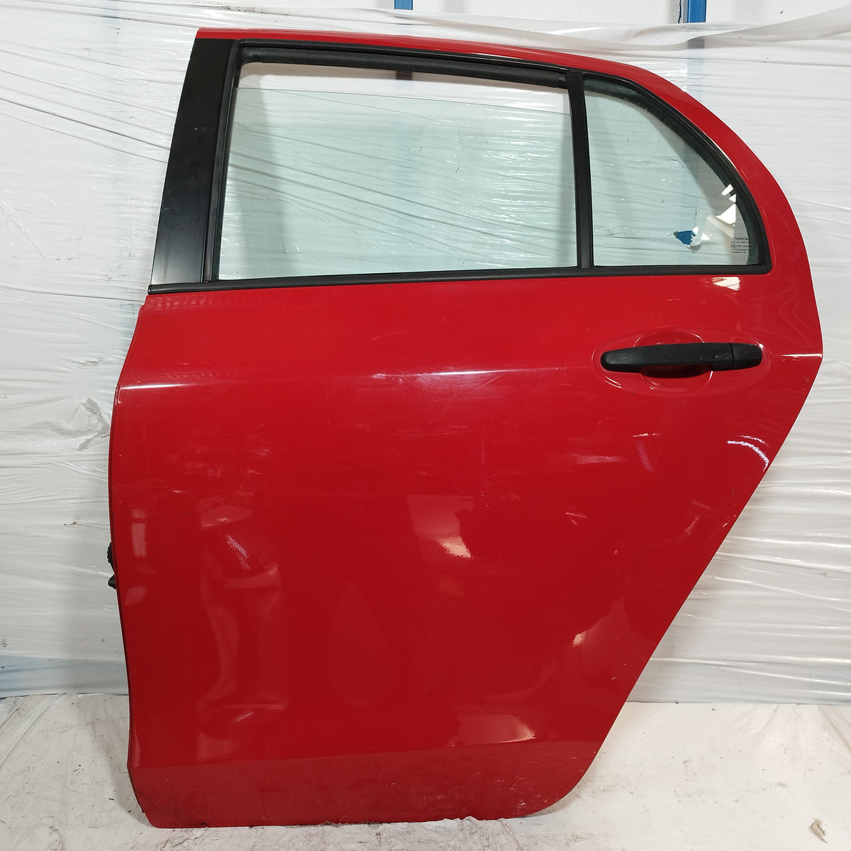 Sportello posteriore sx rosso Toyota Yaris II (XP90) 2005-2011 ecoAC16974