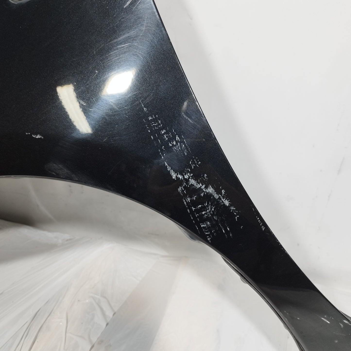 Nissan Note 2011 ecoAC13091 Schwarzer linker vorderer Kotflügel