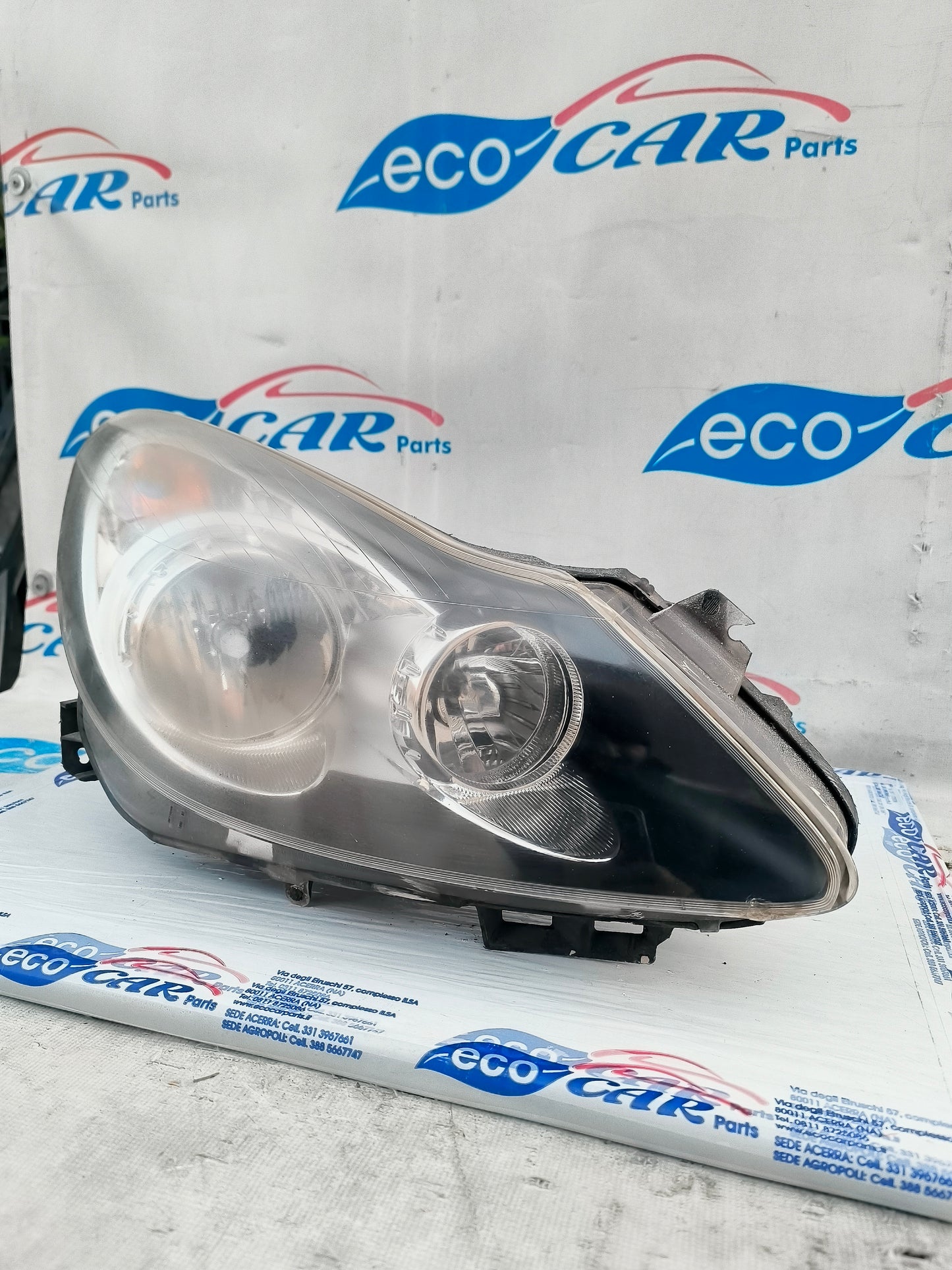 Opel Corsa D dark background right front light ecoAG6221