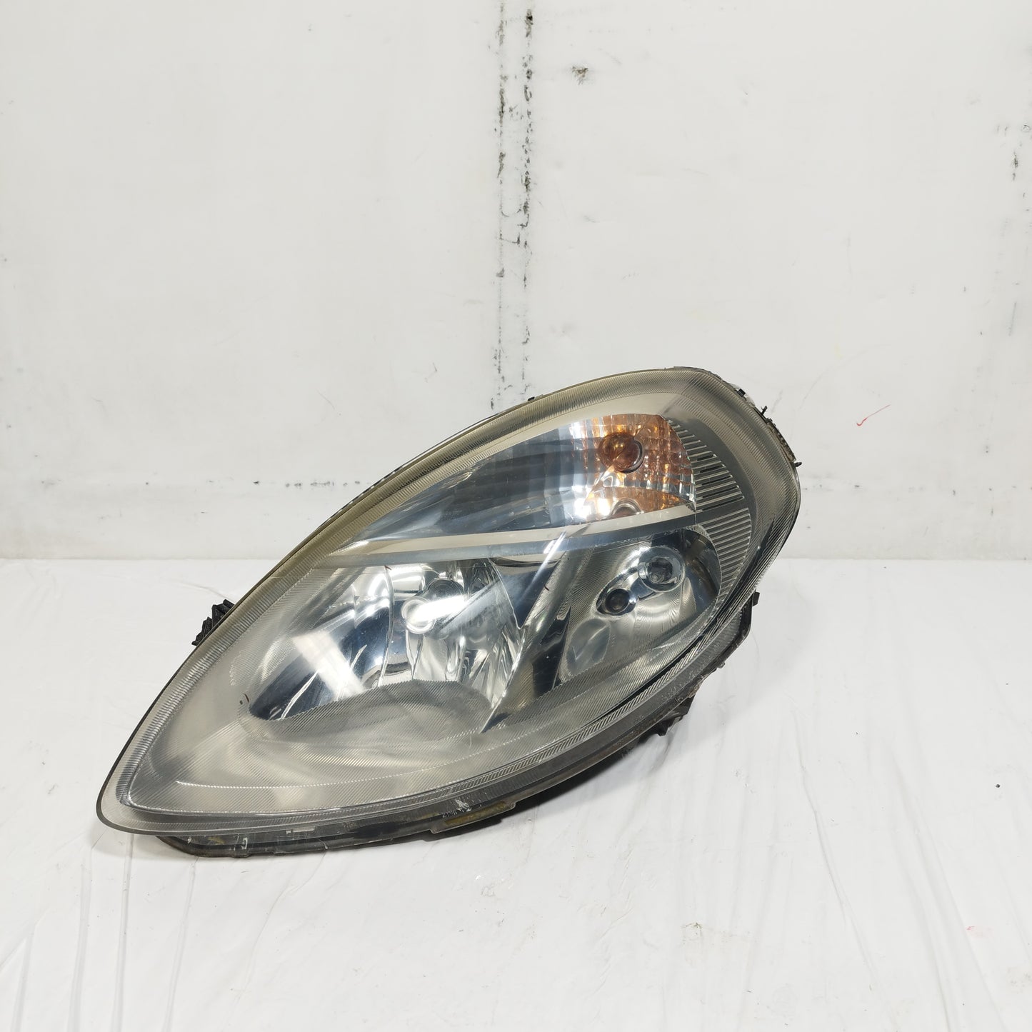 Fanale anteriore sx Lancia Ypsilon 2003-2006 cod: 27053100L ecoAC14750
