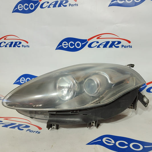 Fanale anteriore sx Fiat Bravo 2008 freccia bianca fondo scuro ecoAG670