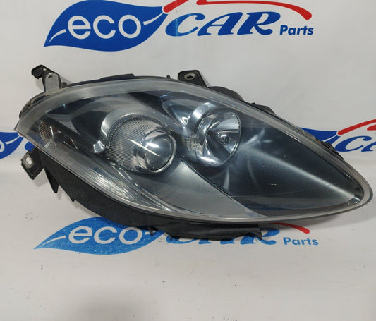 Fanale anteriore dx Fiat Bravo 2010 fondo scuro freccia bianca ecoAC1041