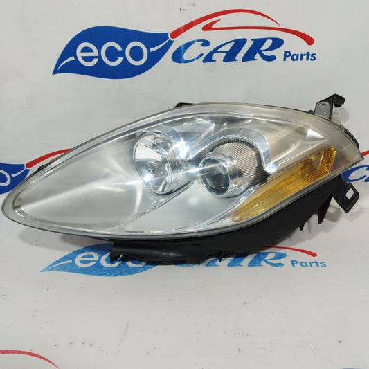 Fanale anteriore sx Fiat Bravo 2008 fondo chiaro freccia gialla ecoAC1314