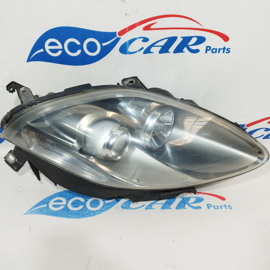 Fanale anteriore dx Fiat Bravo 2010 fondo scuro e freccia bianca ecoAC1318