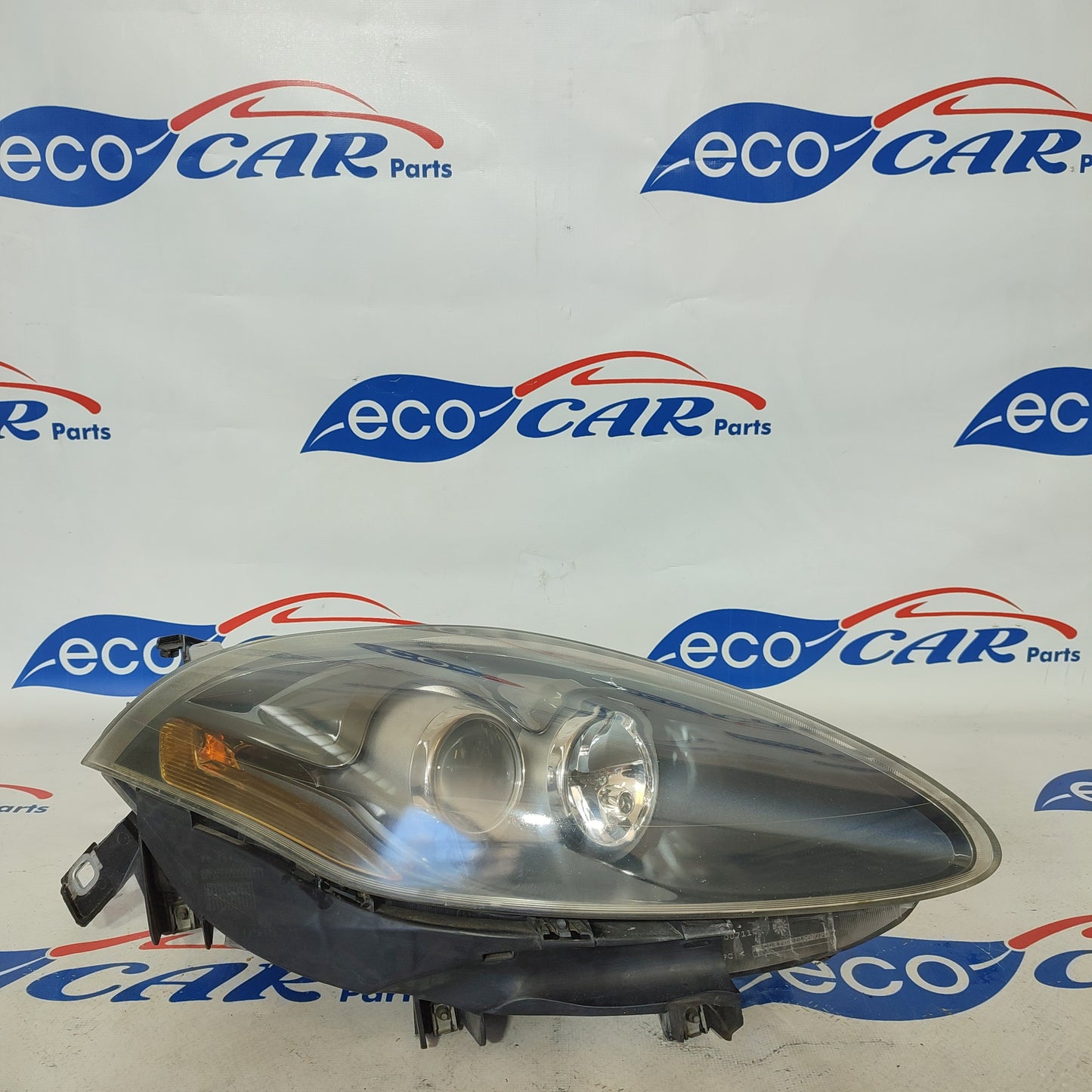 Fanale anteriore dx Fiat Bravo 2008 xenon fondo nero freccia gialla ecoAG1185